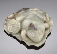 19th Century A celadon and russet jade carving of a toad